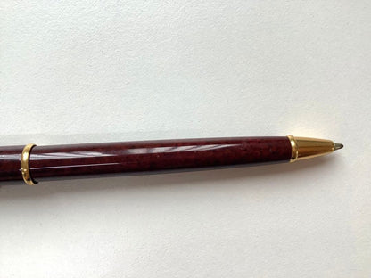 Used Waterman ballpoint pen without ink cartridge displayed on white background