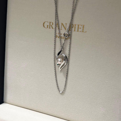Mikimoto Akoya pearl necklace featuring 6mm pearls on a 41cm silver chain weighing 3 grams