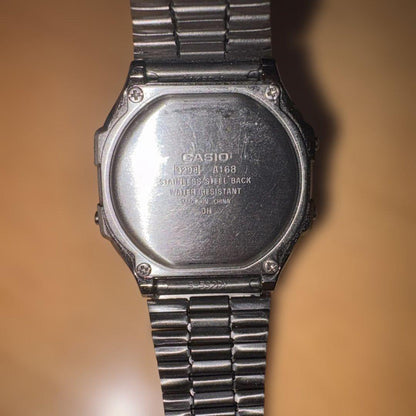 CASIO A168 STEEL BLACK GUNMETAL LCD Reverse Digital Men's Watch — Japanese