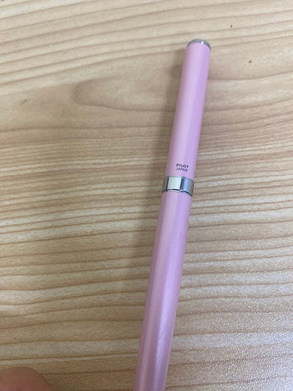 Pilot Cavalier Fountain Pen in pink with fine (F) tip shown uncapped on white background