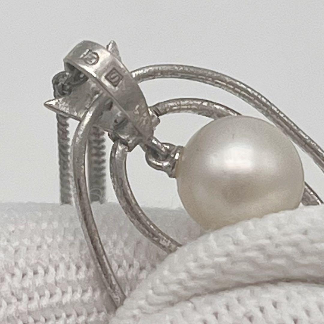 Mikimoto necklace with one cultured white pearl bead on a silver chain with Mikimoto engraved clasp