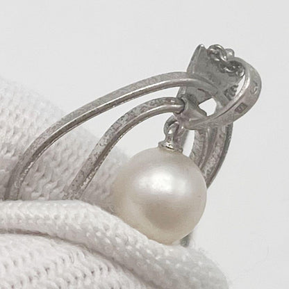 Mikimoto necklace with one cultured white pearl bead on a silver chain with Mikimoto engraved clasp
