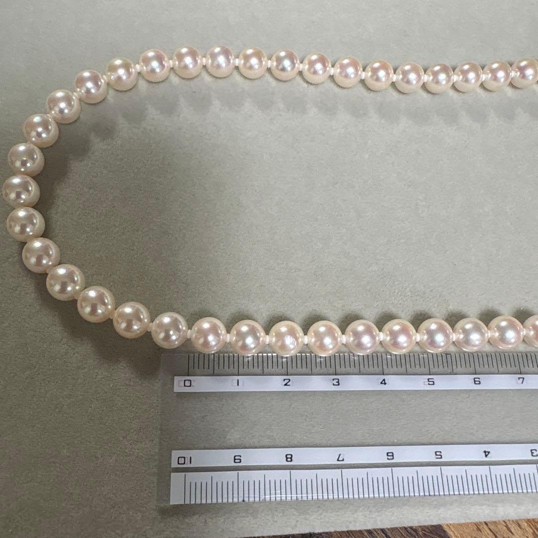 CACHER Akoya pearl necklace with flower pearl and small 0.02ct blue stone on 49 cm chain