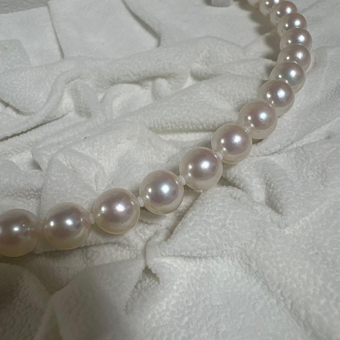 CACHER Akoya pearl necklace with flower pearl and small 0.02ct blue stone on 49 cm chain