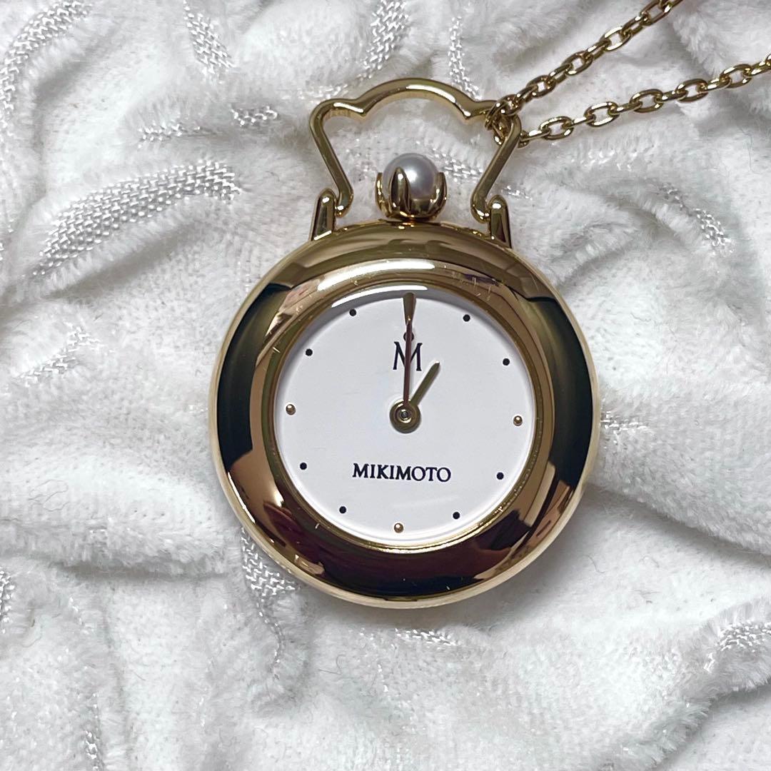 Mikimoto pendant watch with 4mm pearl and 2.5cm clock on a 70cm chain with clock stand