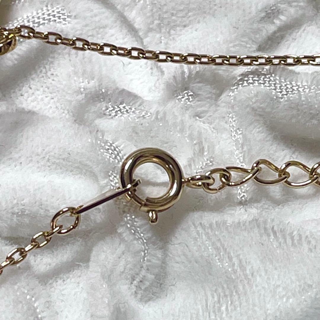 Mikimoto pendant watch with 4mm pearl and 2.5cm clock on a 70cm chain with clock stand