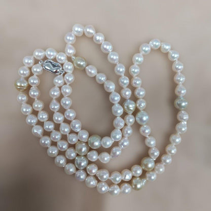Aoyama Akoya 90cm long baroque pearl necklace with white and yellow pearls and silver clasp
