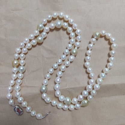 Aoyama Akoya 90cm long baroque pearl necklace with white and yellow pearls and silver clasp