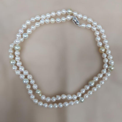 Aoyama Akoya 90cm long baroque pearl necklace with white and yellow pearls and silver clasp