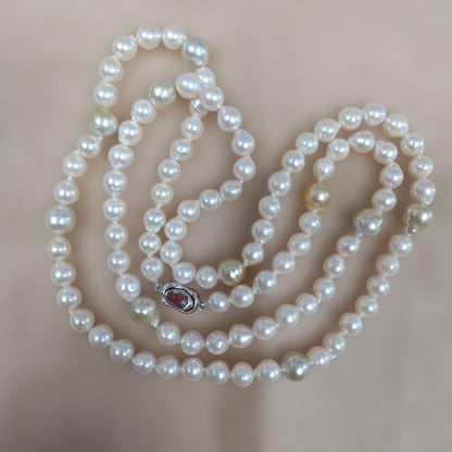 Aoyama Akoya 90cm long baroque pearl necklace with white and yellow pearls and silver clasp