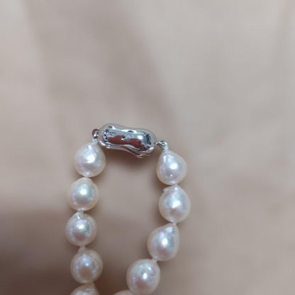 Aoyama Akoya 90cm long baroque pearl necklace with white and yellow pearls and silver clasp
