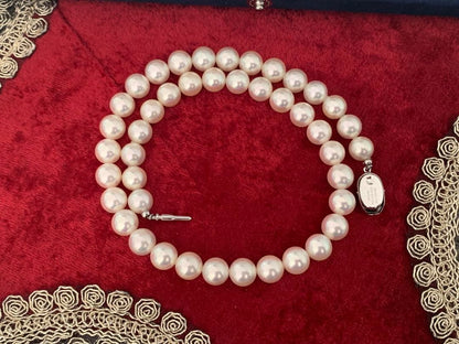 Akoya pearl necklace with 43 round 9mm pearls on a 41cm strand with push-in clasp