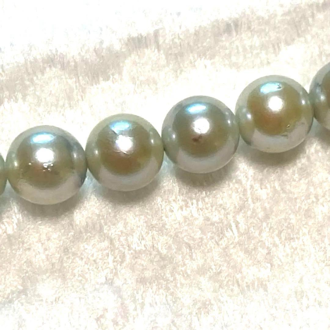 Akoya Pearl Necklace Aurora with 4.0-4.5mm white pink pearls and silver clasp on white background