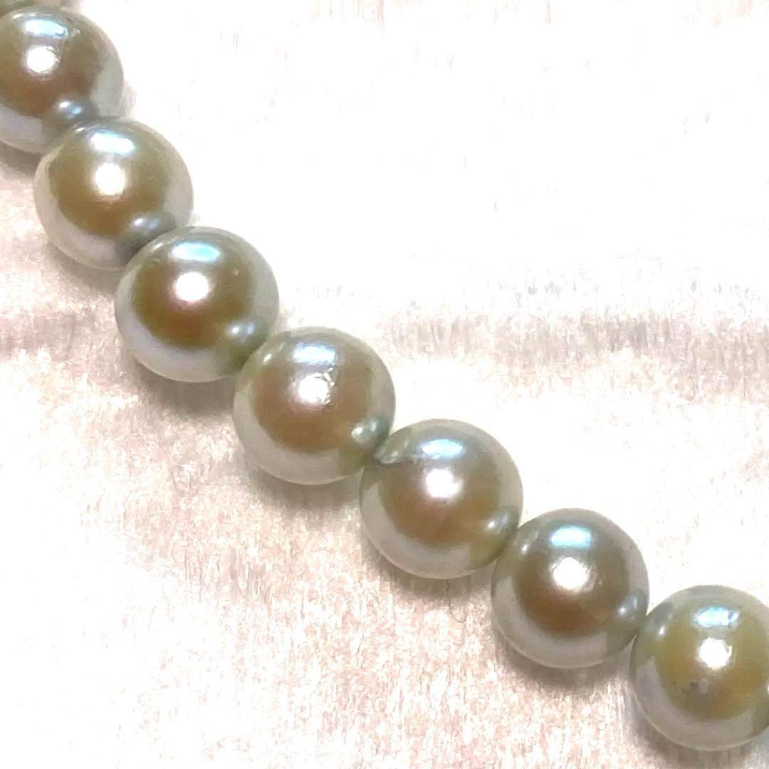 Akoya Pearl Necklace Aurora with 4.0-4.5mm white pink pearls and silver clasp on white background