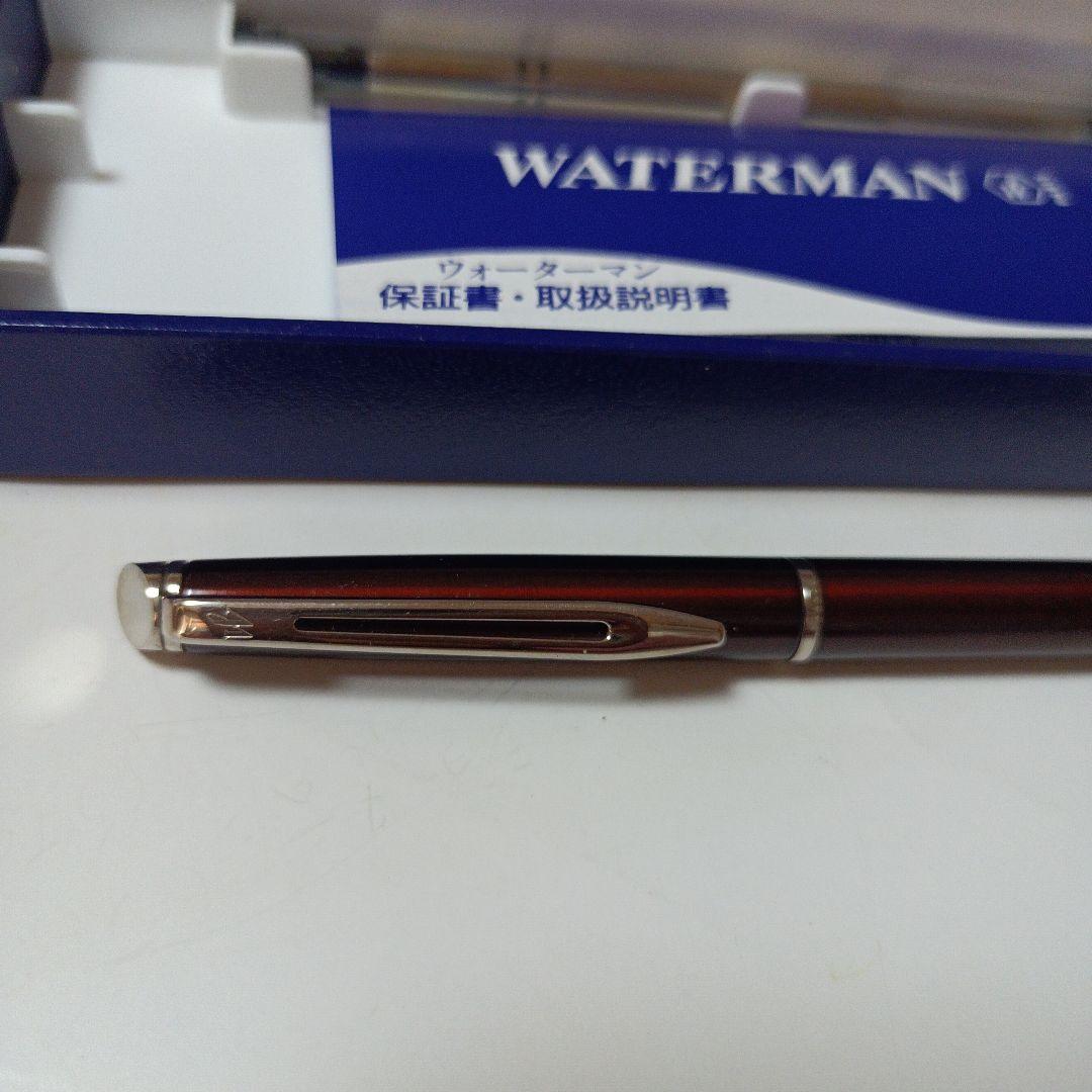 WATERMAN Hemisphere ballpoint pen in purple stainless steel with twist action opening and black ink