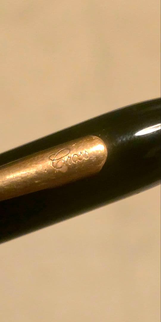 Cross black ballpoint pen with gold-colored decoration featuring classic 廃番柄 design