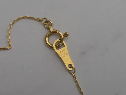 Agete K18 gold necklace featuring a 0.04 carat diamond with a stylish curve motif design