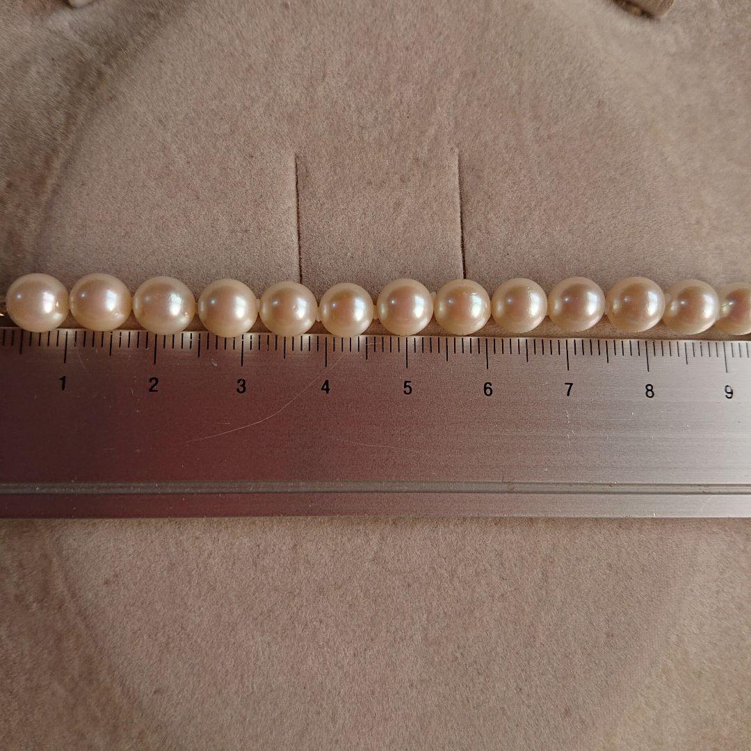 44cm necklace with large 15mm baroque South Sea pearl and 6-8mm Akoya pearls showcasing natural blemishes and luster