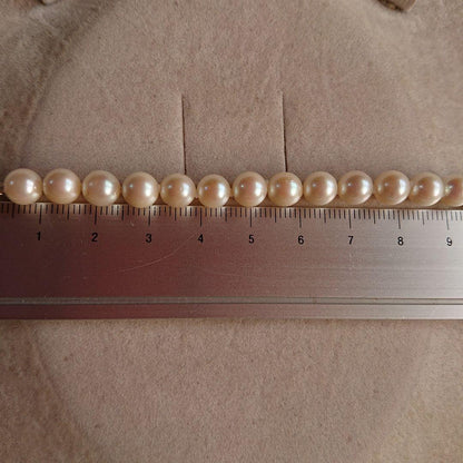 44cm necklace with large 15mm baroque South Sea pearl and 6-8mm Akoya pearls showcasing natural blemishes and luster