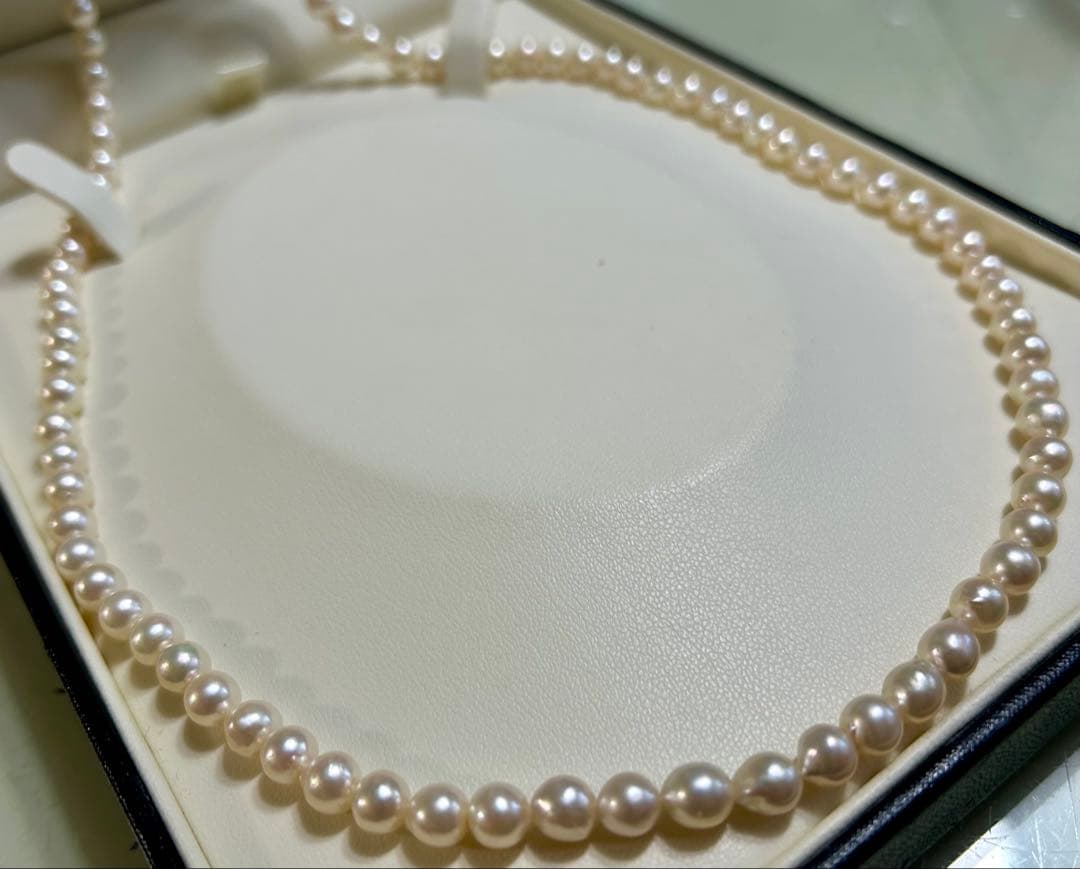Akoya pearl long necklace with 5-5.5mm pearls and silver clasp measuring about 80cm