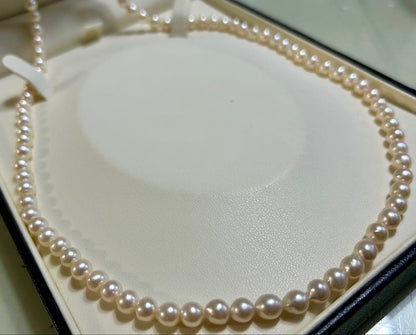 Akoya pearl long necklace with 5-5.5mm pearls and silver clasp measuring about 80cm