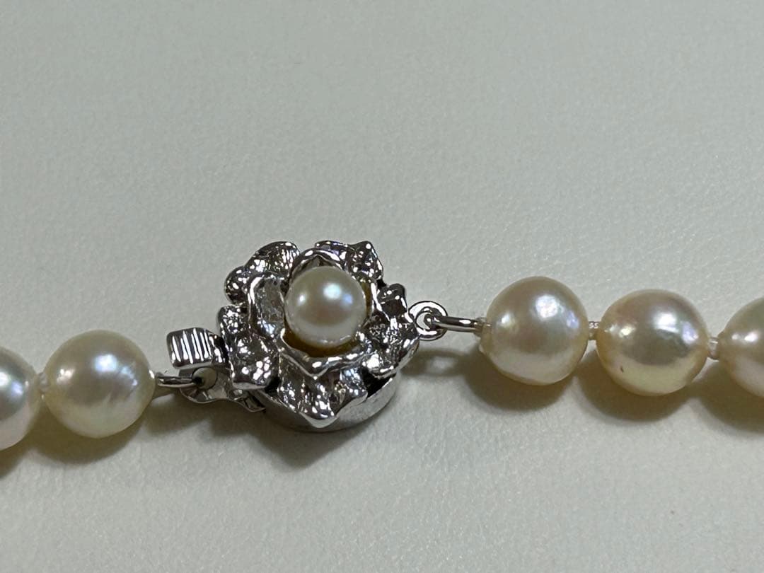 Akoya pearl long necklace with 5-5.5mm pearls and silver clasp measuring about 80cm