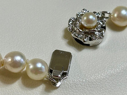 Akoya pearl long necklace with 5-5.5mm pearls and silver clasp measuring about 80cm