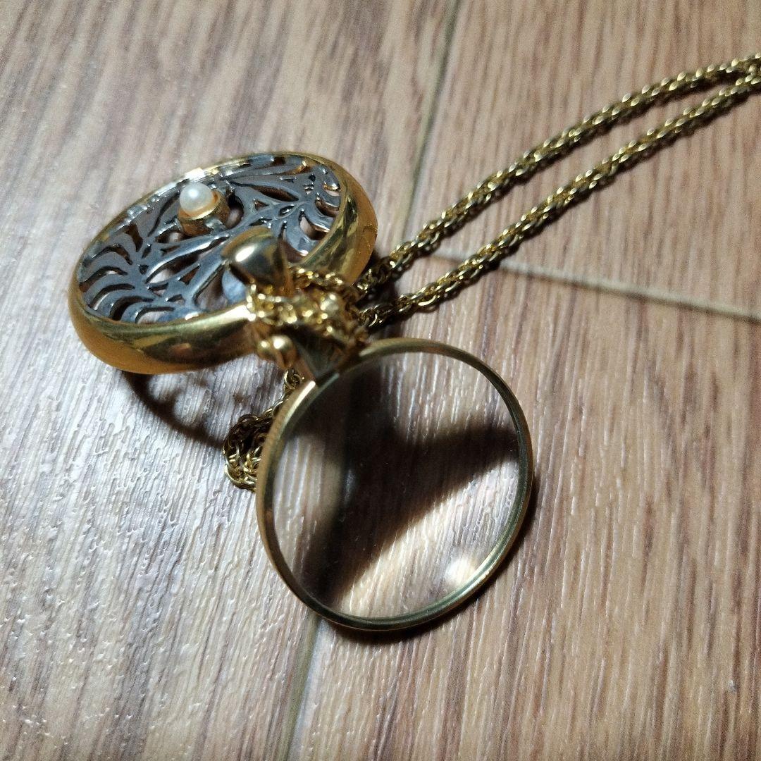 Mikimoto Pearl Loupe Pendant Necklace with 3mm pearl on gold chain 63cm, shown on white background