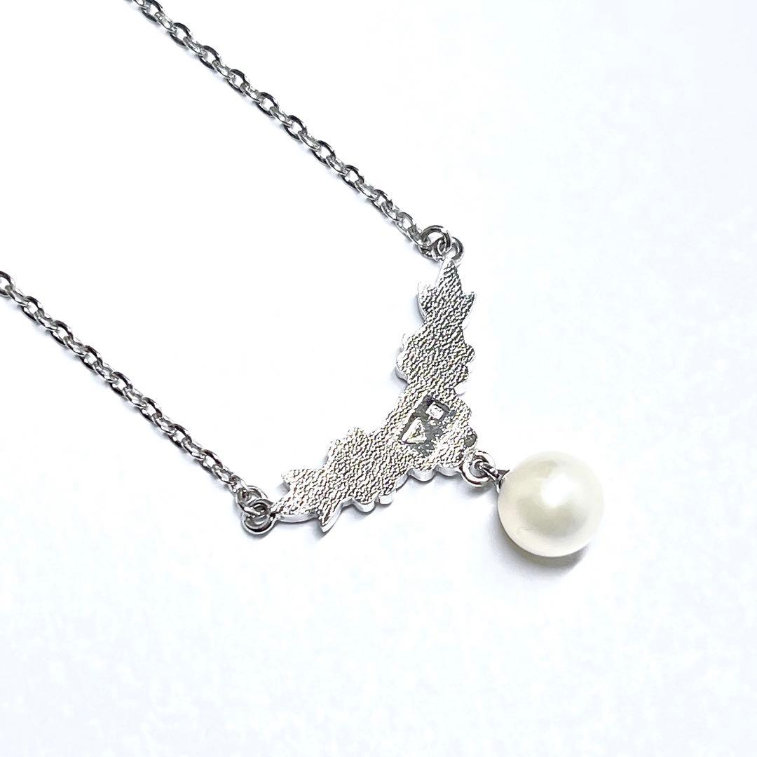 Mikimoto vintage pearl necklace with flower design in silver metal, 41cm length
