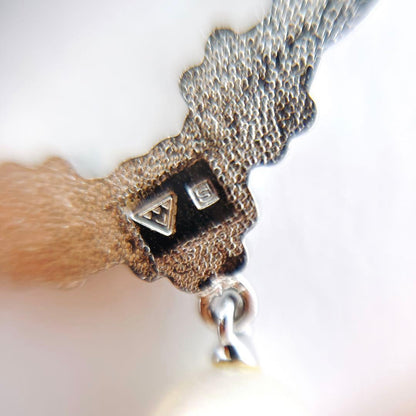 Mikimoto vintage pearl necklace with flower design in silver metal, 41cm length