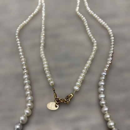 Agete Gradient Long Pearl Necklace measuring 100 cm with varying pearl sizes on a white background