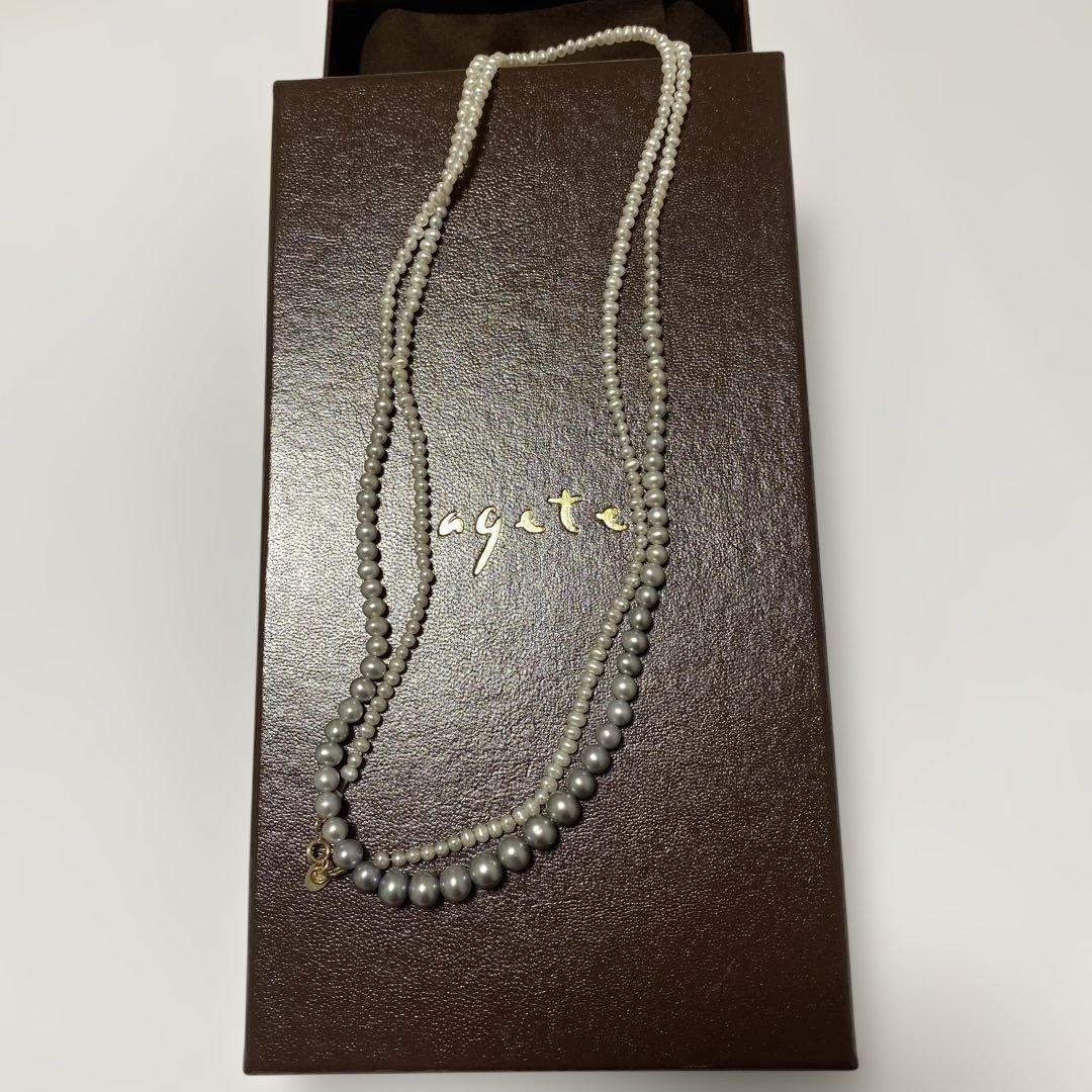 Agete Gradient Long Pearl Necklace measuring 100 cm with varying pearl sizes on a white background
