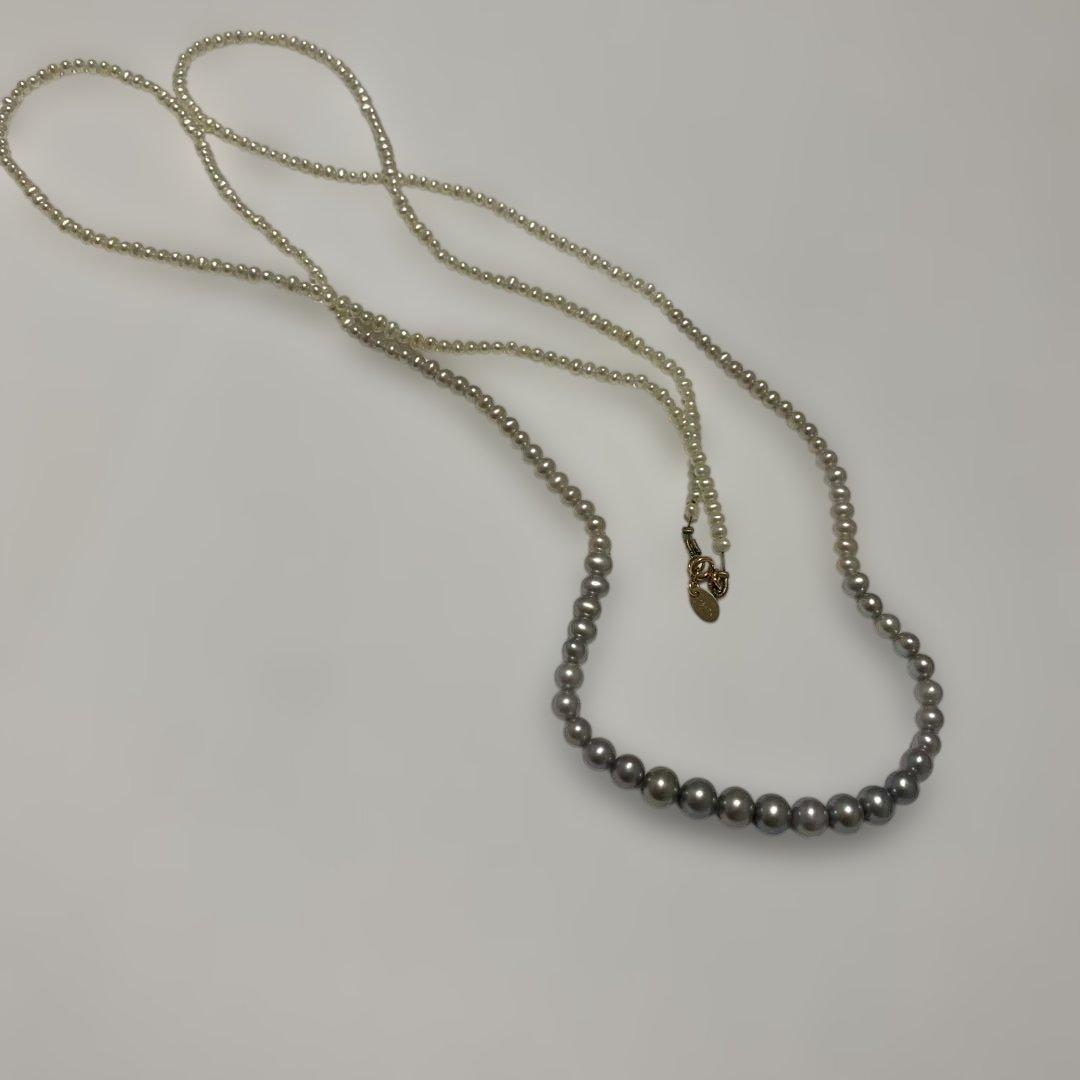 Agete Gradient Long Pearl Necklace measuring 100 cm with varying pearl sizes on a white background