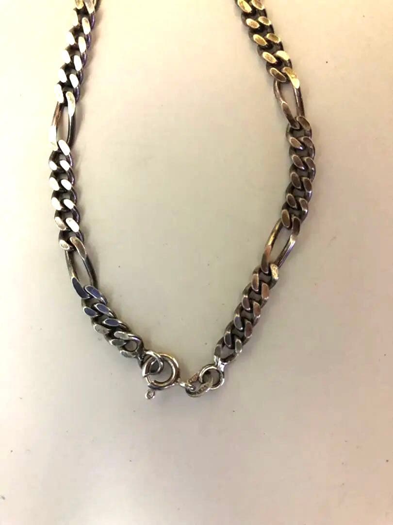 Agette 925 silver ball chain necklace paired with vintage Figaro chain on white background