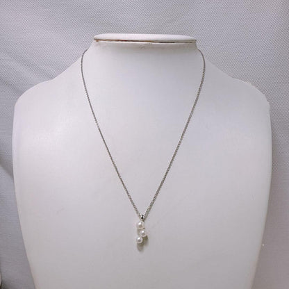 Tasaki silver necklace featuring linked three pearls with an adjustable 38-42 cm chain