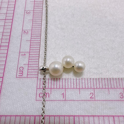 Tasaki silver necklace featuring linked three pearls with an adjustable 38-42 cm chain