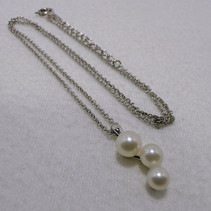 Tasaki silver necklace featuring linked three pearls with an adjustable 38-42 cm chain