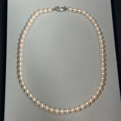 Akoya pearl necklace with 6.5-7mm white pearls on a silver chain about 43cm long
