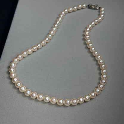 Akoya pearl necklace with 6.5-7mm white pearls on a silver chain about 43cm long