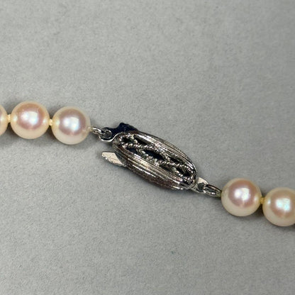 Akoya pearl necklace with 6.5-7mm white pearls on a silver chain about 43cm long