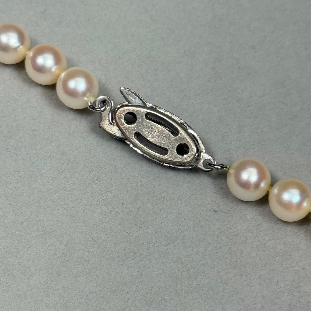 Akoya pearl necklace with 6.5-7mm white pearls on a silver chain about 43cm long