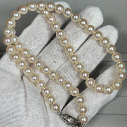 Akoya pearl necklace with 6.5-7mm white pearls on a silver chain about 43cm long