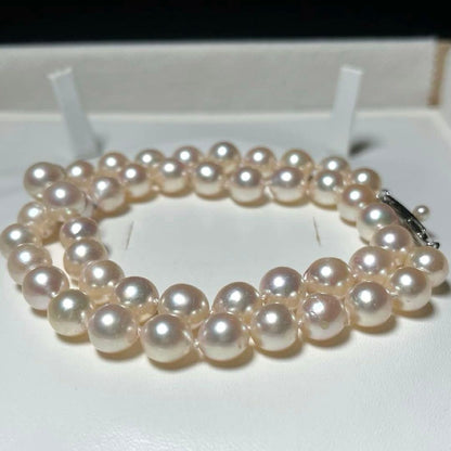 Akoya pearl necklace with semi-round pearls sized 7.6 to 8.4 mm on a 43 cm silver stamped strand
