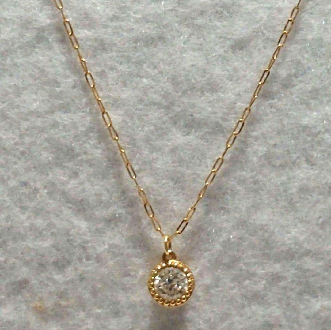 agete 0.15ct K18 gold diamond pendant necklace with link chain on white background