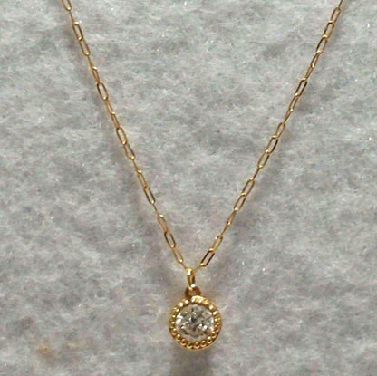 agete 0.15ct K18 gold diamond pendant necklace with link chain on white background