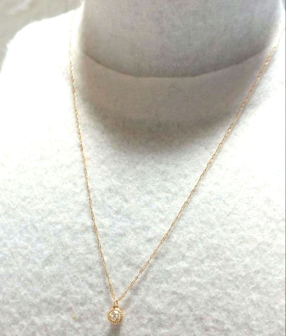 agete 0.15ct K18 gold diamond pendant necklace with link chain on white background