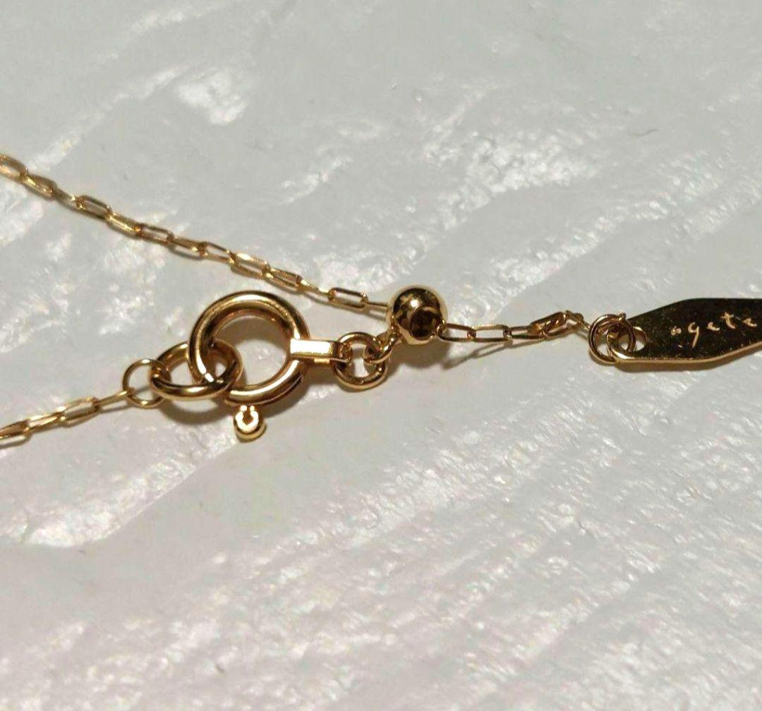 agete 0.15ct K18 gold diamond pendant necklace with link chain on white background