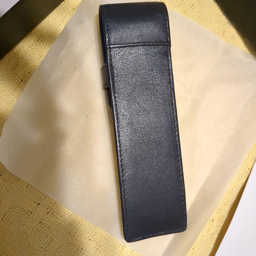Black leather CROSS ballpoint pen case with dedicated box on white background