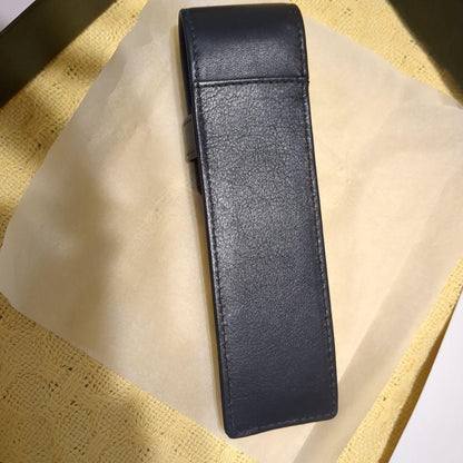 Black leather CROSS ballpoint pen case with dedicated box on white background