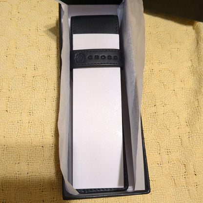 Black leather CROSS ballpoint pen case with dedicated box on white background